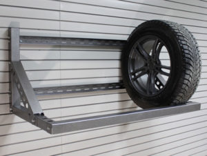 tire rack mounted on garage wall