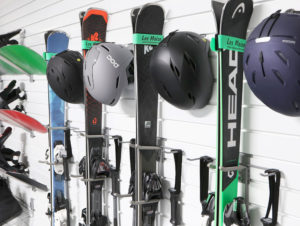 wall storage for winter sports items like skis and helmets