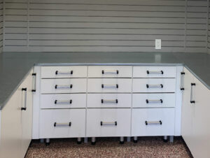 white garage cabinets with lots of drawers